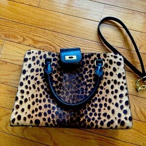 Beautiful leopard print leather bag.
